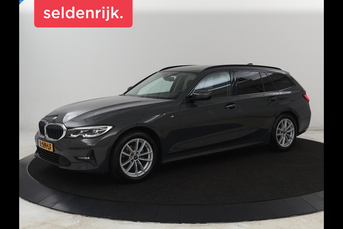 BMW 3 Serie 318i Business Edition | Trekhaak | Sportstoelen | Half leder | Adaptief LED | Carplay | Navigatie | Parkeerhulp | Climate control | Bluetooth | Cruise control