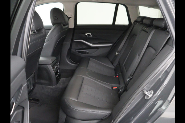 BMW 3 Serie 318i Business Edition | Trekhaak | Sportstoelen | Half leder | Adaptief LED | Carplay | Navigatie | Parkeerhulp | Climate control | Bluetooth | Cruise control