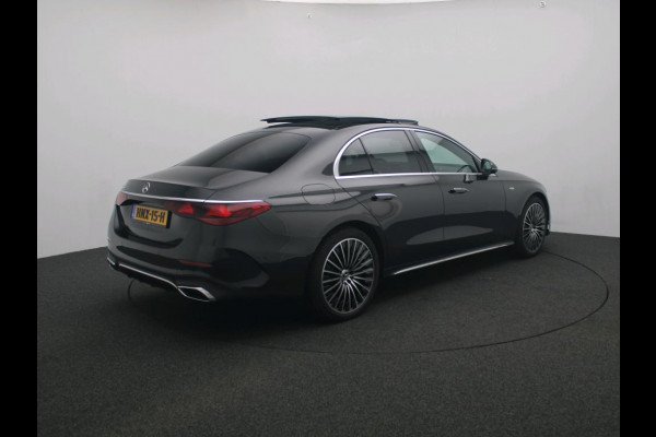 Mercedes-Benz E-Klasse 300 e Sport Edition AMG Line | Panorama Schuif-Kanteldak | Distronic | Lederen bekleding | Alarm | Parkeerpakket met 360°-camera | 20 Inch AMG Velgen. Inclusief 24 maanden MB Certified garantie voor Europa.