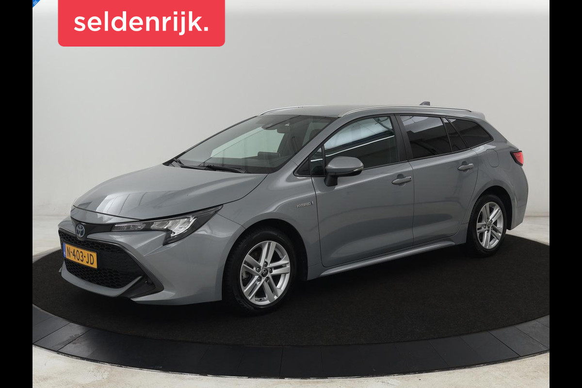 Toyota Corolla 1.8 Hybrid Business | Trekhaak | Camera | Adaptive cruise | Carplay | Full LED | Climate control | Bluetooth | DAB | Getint glas