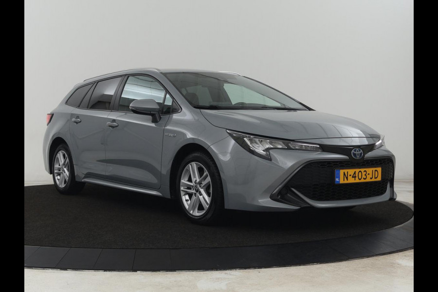 Toyota Corolla 1.8 Hybrid Business | Trekhaak | Camera | Adaptive cruise | Carplay | Full LED | Climate control | Bluetooth | DAB | Getint glas