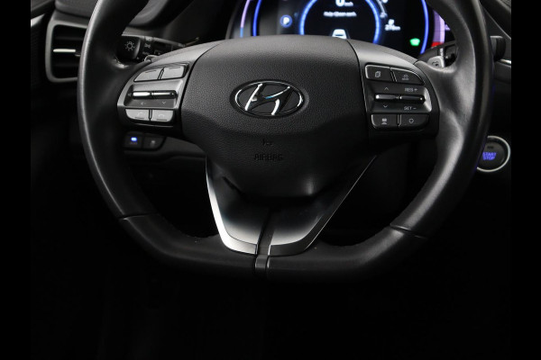 Hyundai IONIQ Comfort EV 38 kWh | SOH 100% | Stoelverwarming | Adaptive cruise | Warmtepomp | Carplay | Camera | Full LED | Keyless | Navigatie | Infinity Sound