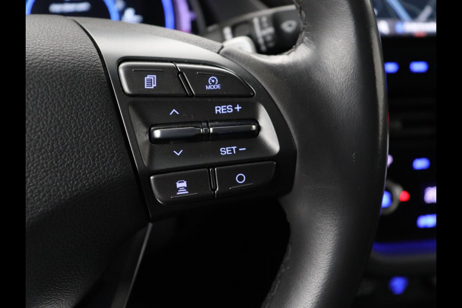 Hyundai IONIQ Comfort EV 38 kWh | SOH 100% | Stoelverwarming | Adaptive cruise | Warmtepomp | Carplay | Camera | Full LED | Keyless | Navigatie | Infinity Sound