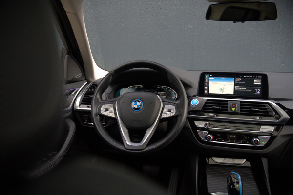 BMW iX3 High Executive 80 kWh | Panoramadak | Keyless | Stoelverwarming | Harman Kardon | Memory Seat | Head-Up Display | 360 Camera | Adaptief Onderstel | Trekhaak | Adaptive LED | Elektrische Stoelen | Apple Carplay |