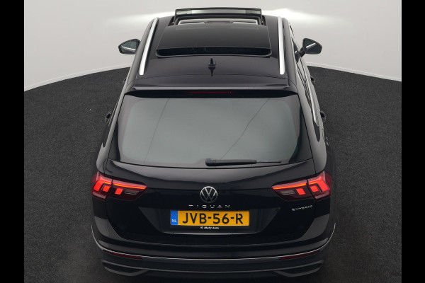 Volkswagen Tiguan 1.4 TSI eHybrid Elegance Plug In Hybrid 245pk Dealer O.H. PHEV | Trekhaak Af Fabriek | Panodak | Adaptive Cruise | Camera | Stuur Verwarmd | Apple Carplay | Keyless | Blis | Navigatie | DAB |