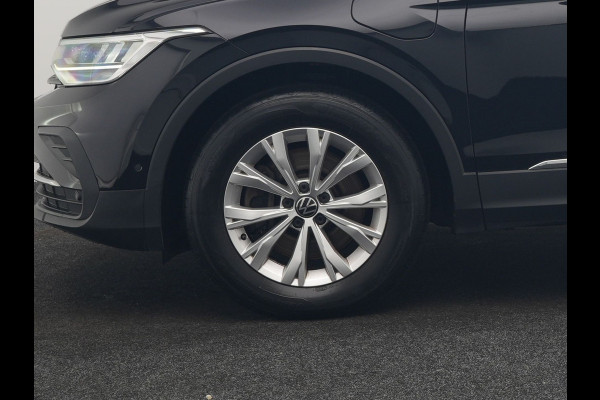 Volkswagen Tiguan 1.4 TSI eHybrid Elegance Plug In Hybrid 245pk Dealer O.H. PHEV | Trekhaak Af Fabriek | Panodak | Adaptive Cruise | Camera | Stuur Verwarmd | Apple Carplay | Keyless | Blis | Navigatie | DAB |