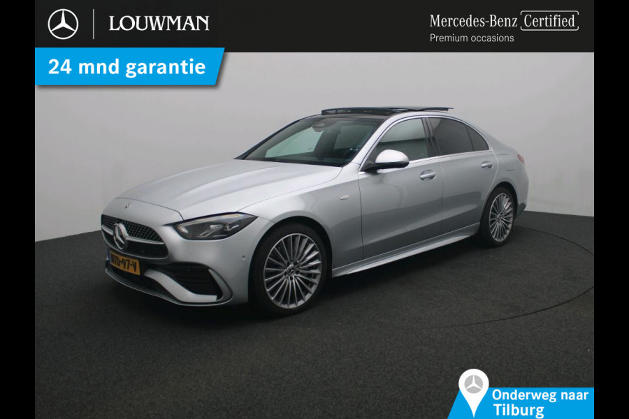 Mercedes-Benz C-Klasse 300 e Business Solution AMG AMG Line | Panorama Schuif-Kanteldak | Distronic | Lederen bekleding | Alarm | Parkeerpakket met 360°-camera | 20 Inch AMG Velgen. Inclusief 24 maanden Mercedes-Benz Certified garantie voor Europa.