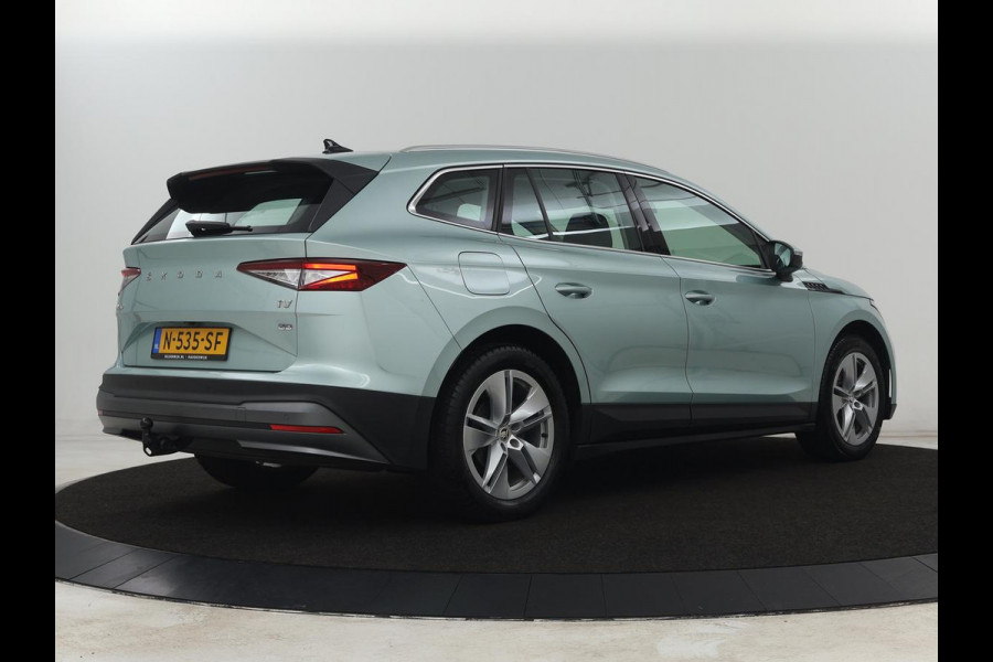 Škoda ENYAQ iV 80 | Panoramadak | Trekhaak | Stoelverwarming | Camera | Sfeerverlichting | Carplay | Navigatie | Achterbankverwarming | Full LED | Parkeerhulp | Cruise control