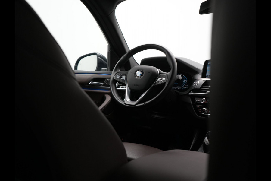 BMW X3 xDrive30e Luxury Line Plug In Hybrid 293pk Dealer O.H. PHEV | Trekhaak Af Fabriek | Camera | Adaptief Onderstel | Lederen Sportstoelen Memory & Verwarmd | Hifi Sound | Sfeerverlichting | Blis | Apple Carplay | Keyless | Navigatie | DAB |