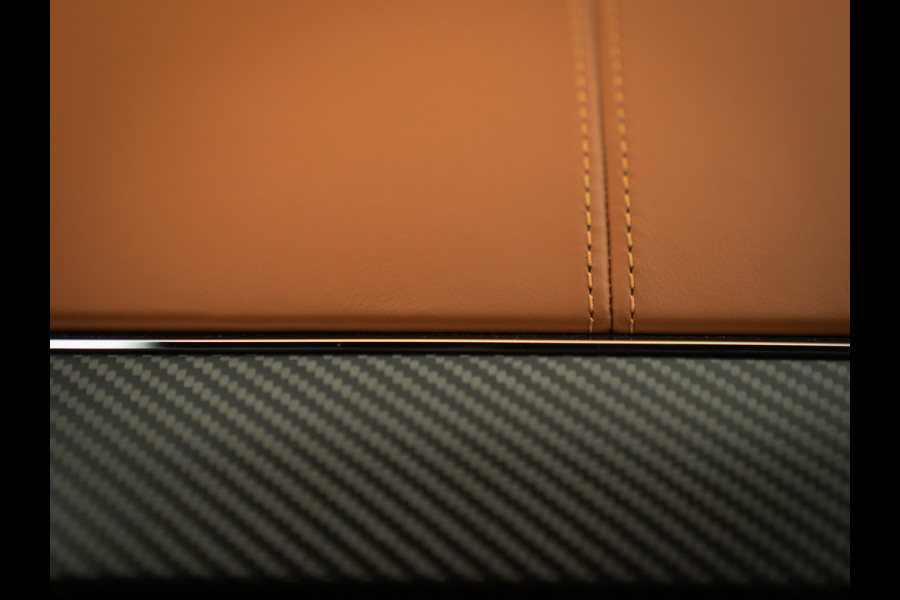 Aston Martin Vanquish | Minotaur Green | Bronze dreamlines | Carbon interior | Stoelventilatie