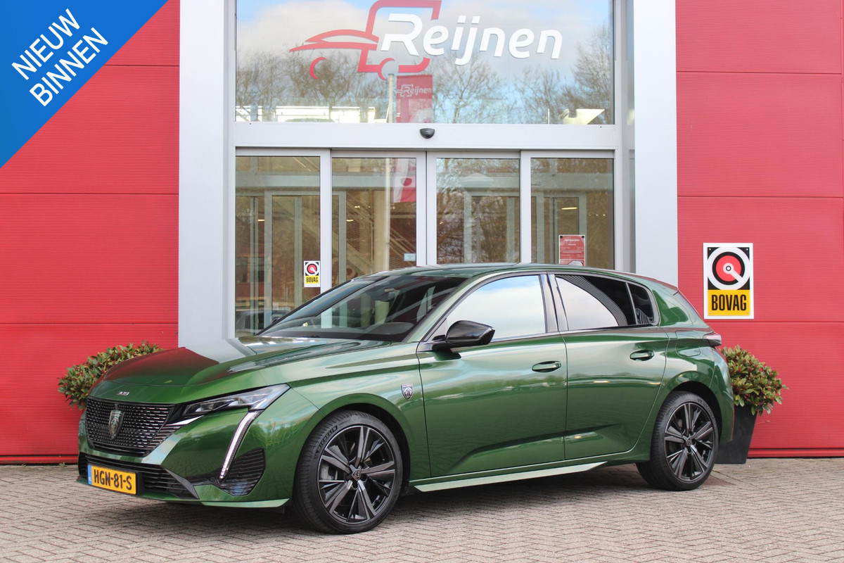 Peugeot 308 1.6 Plug-in Hybrid 225PK GT | ELEKTRISCH BEDIENBARE BESTUURDERSSTOEL MET GEHEUGENFUNCTIE | VOORSTOELEN MET VERWARMING EN MASSAGE FUNCTIE | 360° CAMERA | PARKEERSENSOREN VOOR + ACHTER | NAVIGATIE | DRAADLOZE APPLE CARPLAY/ANDROID AUTO | DAB+ RADIO | DODEHOEK DETECTIE | ADAPTIVE CRUISE CONTROL | KEYLESS ENTRY/START | 18" LICHTEMETALEN VELGEN |