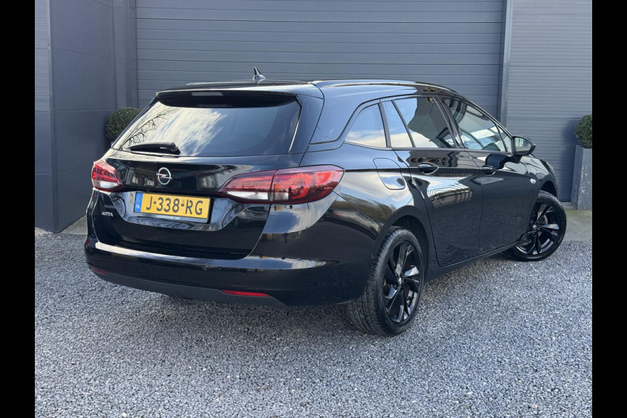 Opel Astra Sports Tourer 1.2 Ultimate 146pk,Leder-Alcantara,2e Eigenaar,6 Bak,Navi,Camera,Stoelverw-Stuurverw.Keyless,Lm velgen,Pdc V+A,Rijstrooksensor,BSD,N.A.P,Dealer Onderhouden,Apk tot 10-2026