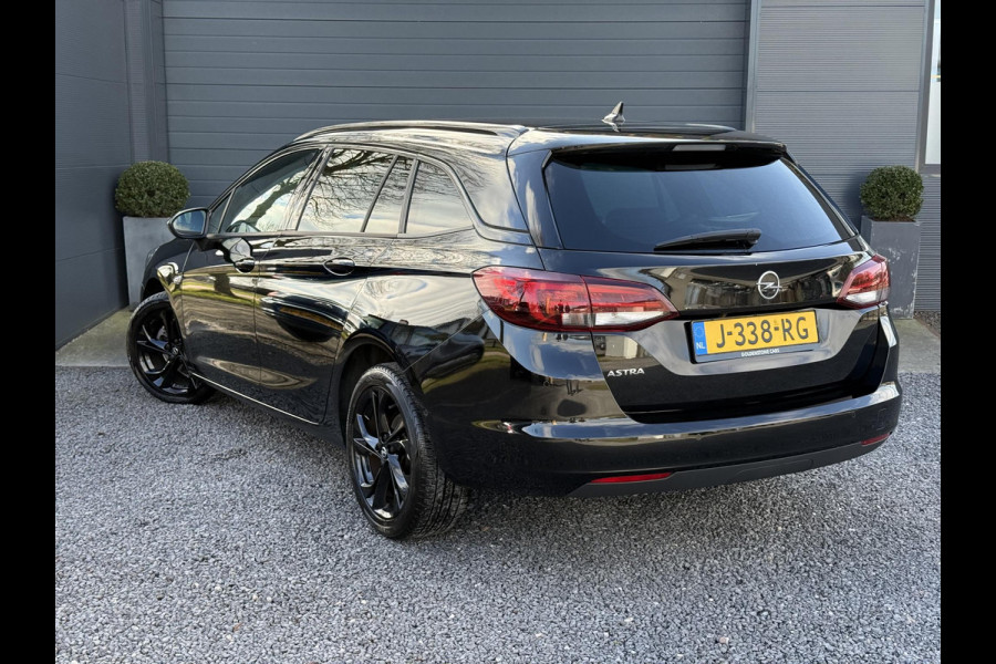 Opel Astra Sports Tourer 1.2 Ultimate 146pk,Leder-Alcantara,2e Eigenaar,6 Bak,Navi,Camera,Stoelverw-Stuurverw.Keyless,Lm velgen,Pdc V+A,Rijstrooksensor,BSD,N.A.P,Dealer Onderhouden,Apk tot 10-2026