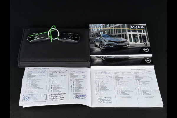 Opel Astra Sports Tourer 1.2 Ultimate 146pk,Leder-Alcantara,2e Eigenaar,6 Bak,Navi,Camera,Stoelverw-Stuurverw.Keyless,Lm velgen,Pdc V+A,Rijstrooksensor,BSD,N.A.P,Dealer Onderhouden,Apk tot 10-2026