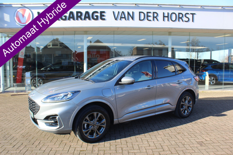 Ford Kuga 2.5-225 PK PHEV ST-Line X. 1500kg Trekgewicht Hybride rijden voor een reële prijs ! Autm. airco, Stoel- en voorraamverw., Side- en lane assist, Adaptieve cruise cntrl, elektr. achterklep, Keyless entry/keyless go, Trekhaak , Navigatie, Telefoonvoorb. etc