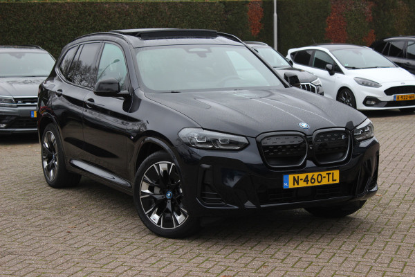 BMW iX3 High Executive 80 kWh / SoH 94.7% / Trekhaak / Panoramadak / 360Camera / Head-up / 20'' / Leder / Harman Kardon / Sfeerverlichting / Dodehoek / DAB / Stuur+Stoelverwarming / ACC