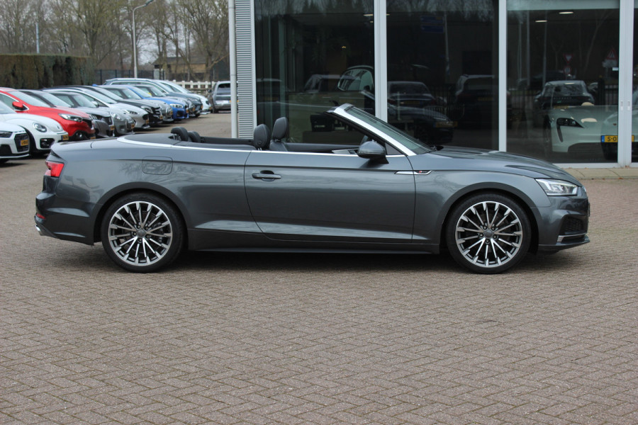 Audi A5 Cabriolet 2.0 TFSI Launch Edition NL Auto! / Trekhaak / Leder / Nekverwarming / Navigatie / Parkeerhulp V+A / 19'' / Windscherm / Stoelverwarming / Cruise Control