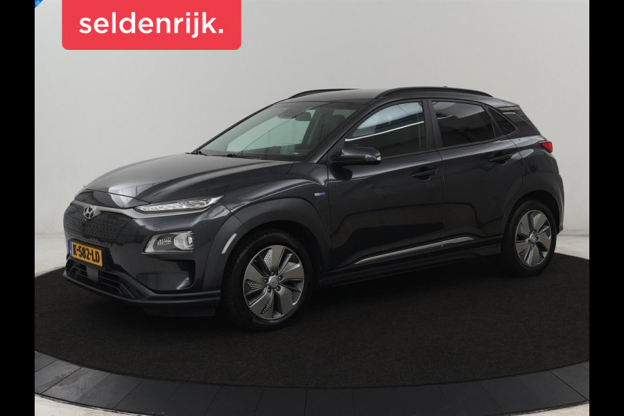 Hyundai Kona EV Limited 64 kWh | SOH 100% | 3 Fase | Stoelventilatie | Head-Up | Adaptive cruise | Camera | Leder | Carplay | Achterbankverwarming | Warmtepomp | Keyless | Full LED | Dodehoek detectie
