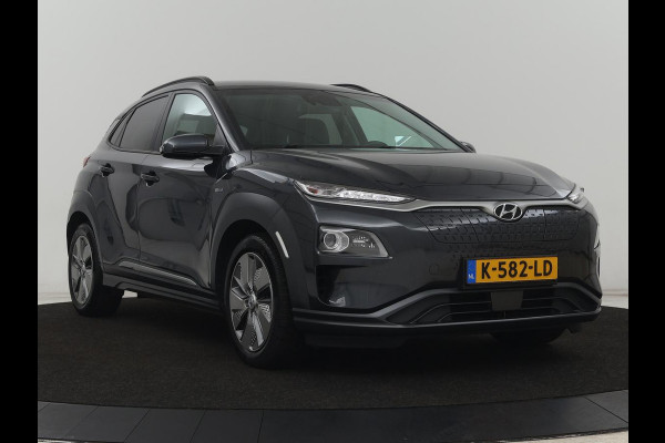 Hyundai Kona EV Limited 64 kWh | SOH 100% | 3 Fase | Stoelventilatie | Head-Up | Adaptive cruise | Camera | Leder | Carplay | Achterbankverwarming | Warmtepomp | Keyless | Full LED | Dodehoek detectie