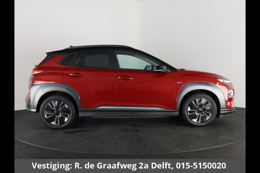 Hyundai Kona EV Premium Two-Tone 64 kWh SOH ACCU 99% | Apple Carplay/Android Auto | Stuur-& Stoelverwarming | Navigatie | Leder | Camera |