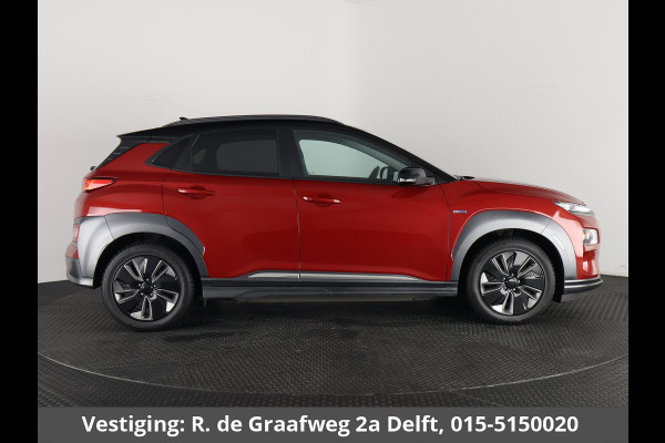 Hyundai Kona EV Premium Two-Tone 64 kWh SOH ACCU 99% | Apple Carplay/Android Auto | Stuur-& Stoelverwarming | Navigatie | Leder | Camera |