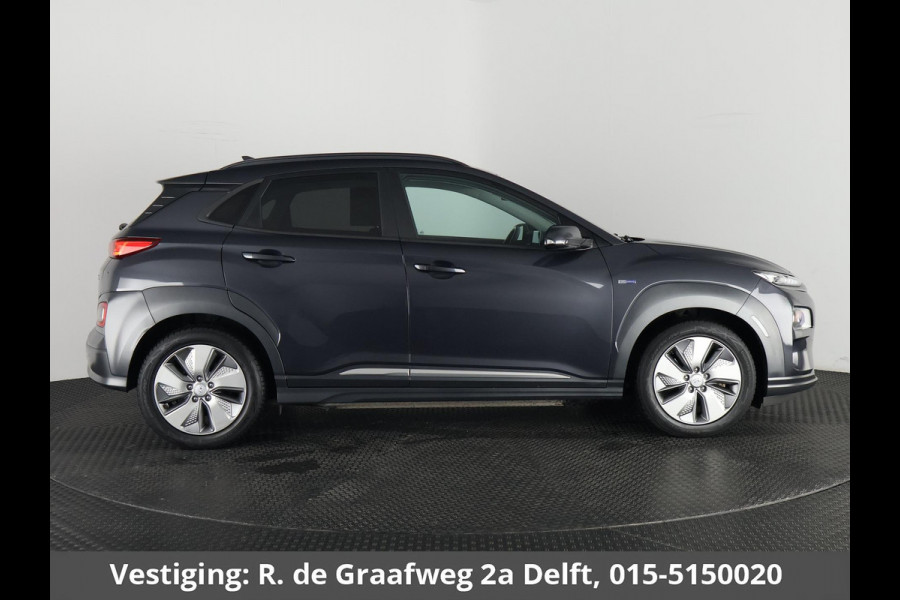 Hyundai Kona EV Premium 64 kWh | Schuif-Kanteldak | Stuur-& Stoelverwarming | Apple Carplay&AndroidAUTO | Leder | Camera |