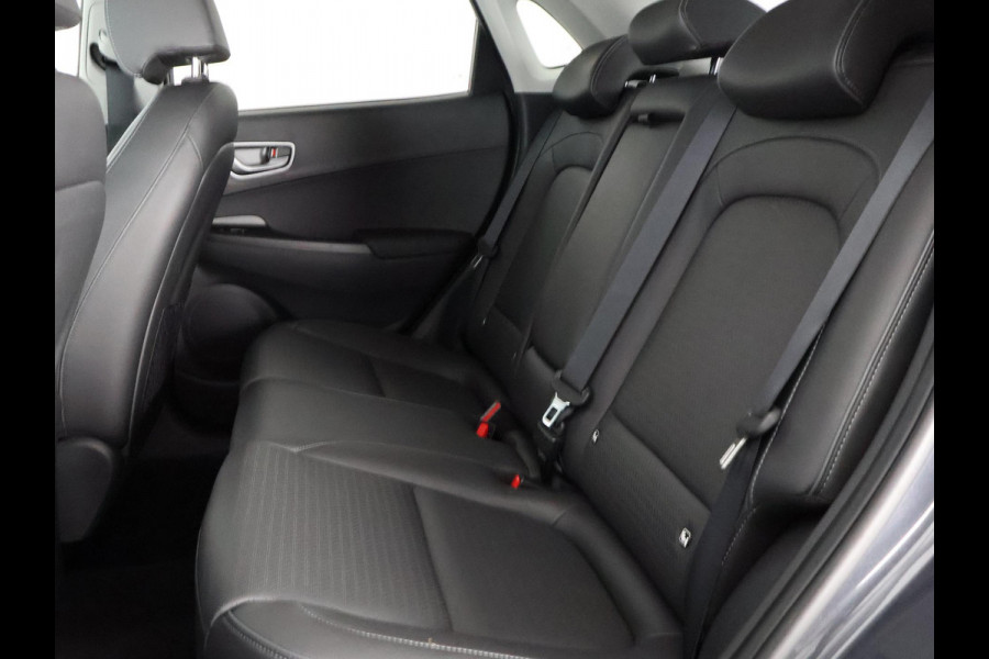 Hyundai Kona EV Premium 64 kWh | Schuif-Kanteldak | Stuur-& Stoelverwarming | Apple Carplay&AndroidAUTO | Leder | Camera |