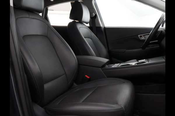 Hyundai Kona EV Premium 64 kWh | Schuif-Kanteldak | Stuur-& Stoelverwarming | Apple Carplay&AndroidAUTO | Leder | Camera |