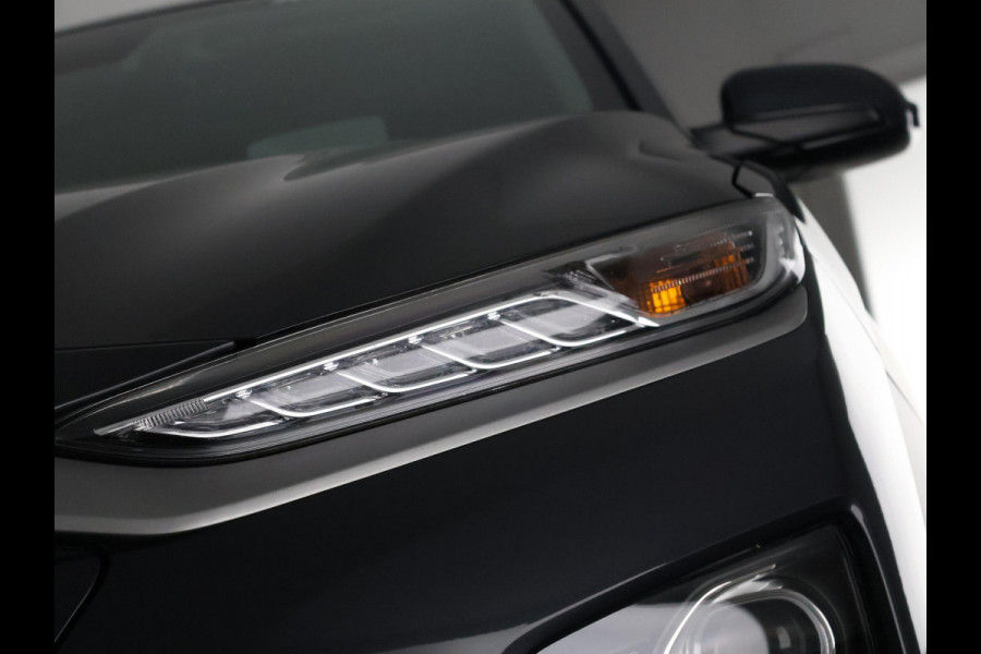 Hyundai Kona EV Premium 64 kWh | Schuif-Kanteldak | Stuur-& Stoelverwarming | Apple Carplay&AndroidAUTO | Leder | Camera |