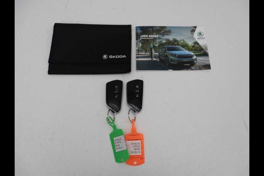 Škoda ENYAQ iV 60 | SOH 92% | Trekhaak | Half leder | Sfeerverlichting | Carplay | Navigatie | 19'' | Cruise control | Parkeerhulp | Full LED