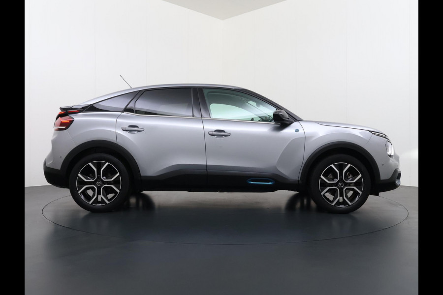 Citroën Ë-C4 Shine 50 kWh SOH 98% 3-FASE LADER | STUUR- & STOELVERWARMING | TREKHAAK | HEAD-UP DISPLAY | CAMERA | KEYLESS START & GO | DODEHOEKDETECTIE | RIJKLAAR MET 12 MAANDEN BOVAG-GARANTIE