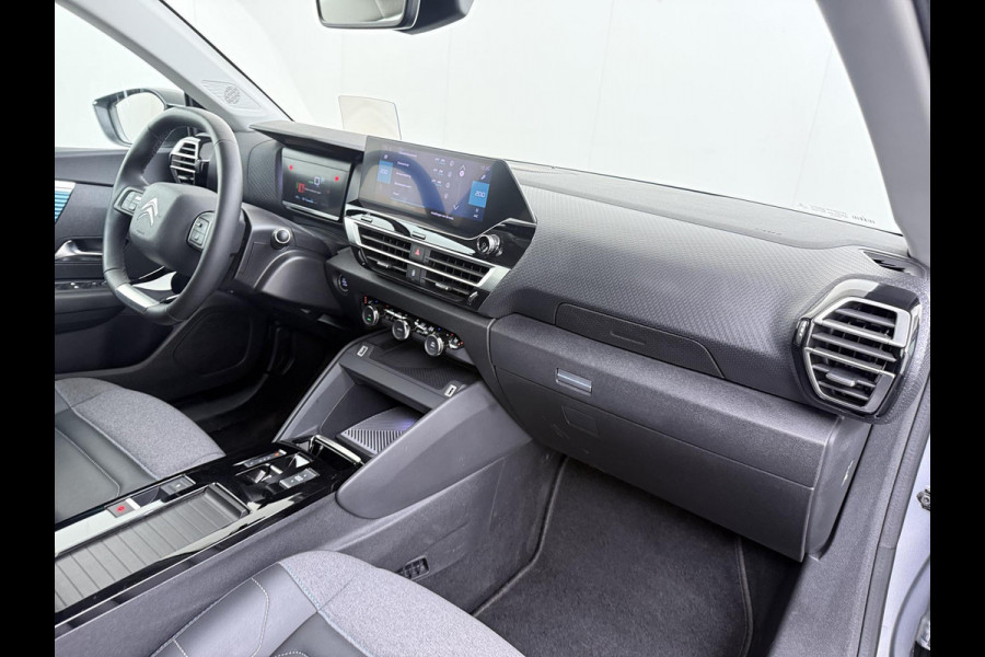 Citroën Ë-C4 Shine 50 kWh SOH 98% 3-FASE LADER | STUUR- & STOELVERWARMING | TREKHAAK | HEAD-UP DISPLAY | CAMERA | KEYLESS START & GO | DODEHOEKDETECTIE | RIJKLAAR MET 12 MAANDEN BOVAG-GARANTIE