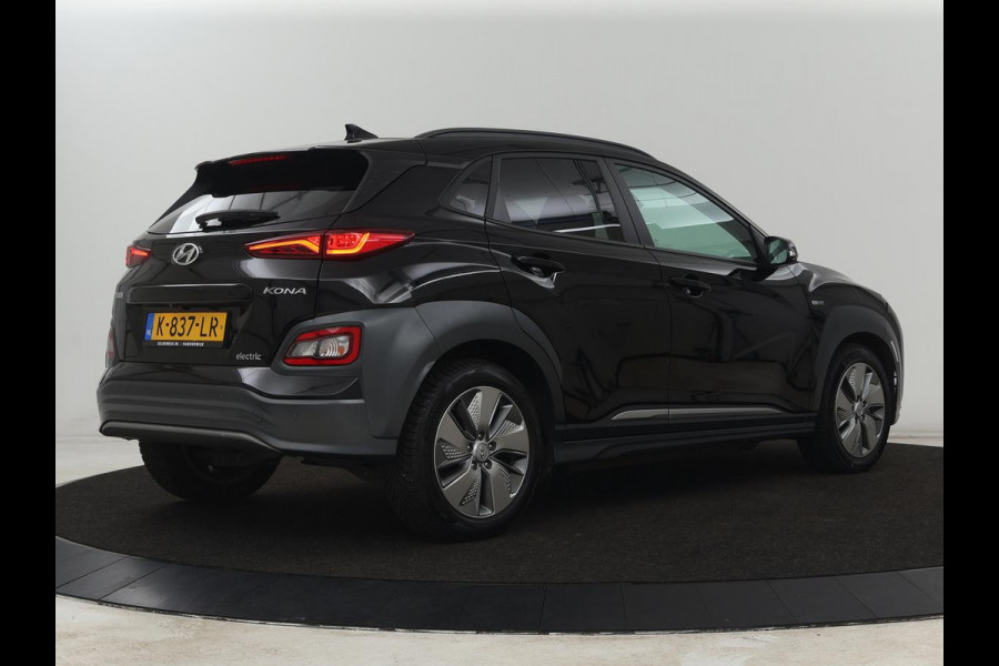 Hyundai Kona EV Limited 64 kWh | SOH 100% | 3 Fase | Stoelventilatie | Head-Up | Adaptive cruise | Camera | Carplay | Achterbankverwarming