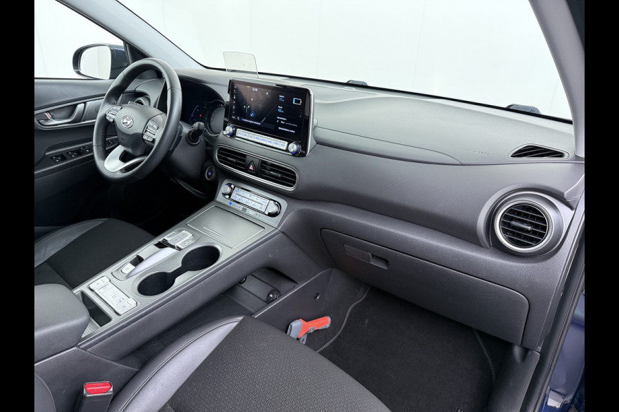 Hyundai Kona EV 64kWh 3 fase SOH-100% Warmtepomp Adaptive-Cruise Head-Up Display 1/2 Leer Krell®-Hifi Apple Carplay Android Adap.Cruise Camer Keyless Privacy Glas DAB Led Blind Spot Lane Assist Origineel Nederlandse Auto € 45.000 nieuw!!