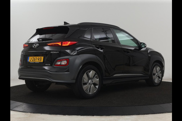 Hyundai Kona EV Fashion 64 kWh | SOH 100% | 3 Fase | Head-Up | Camera | Adaptive cruise | Krell Audio | Wamtepomp | Carplay | Navigatie | Bluetooth