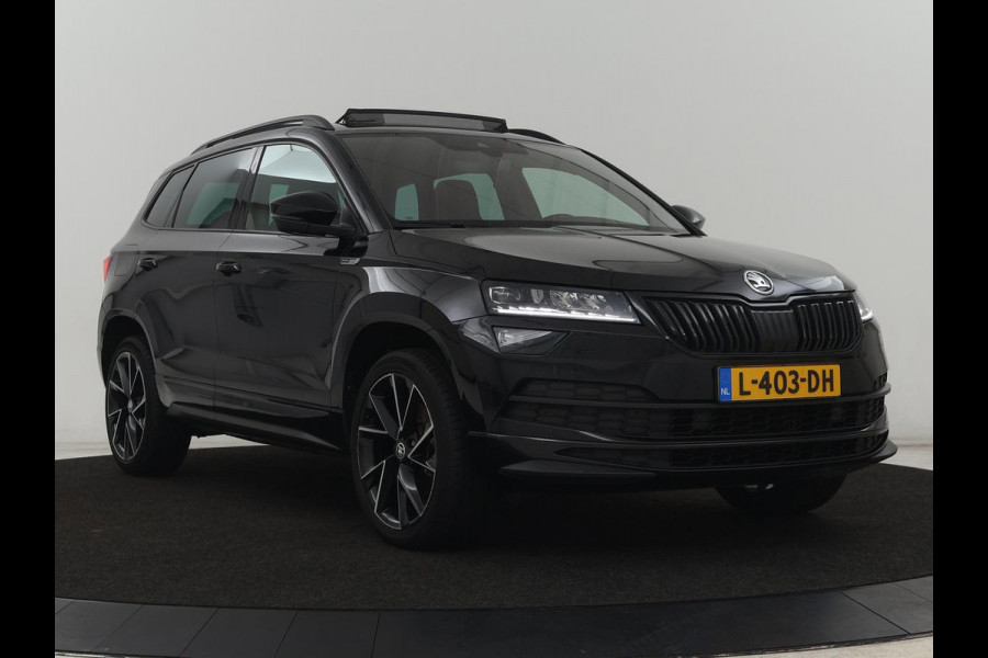 Škoda Karoq 1.5 TSI Sportline | Panoramadak | Stoelverwarming | Virtual Cockpit | Adaptive cruise | Canton Audio | Camera | File Assistent | Keyless | Side Assist | Full LED | Navigatie