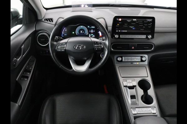 Hyundai Kona EV Premium 64 kWh | SOH 100% | 3 Fase | Stoelventilatie | Leder | Head-Up | Warmtepomp | Camera | Achterbankverwarming | Carplay | Navigatie | Adaptive cruise | Keyless | Parkeerhulp
