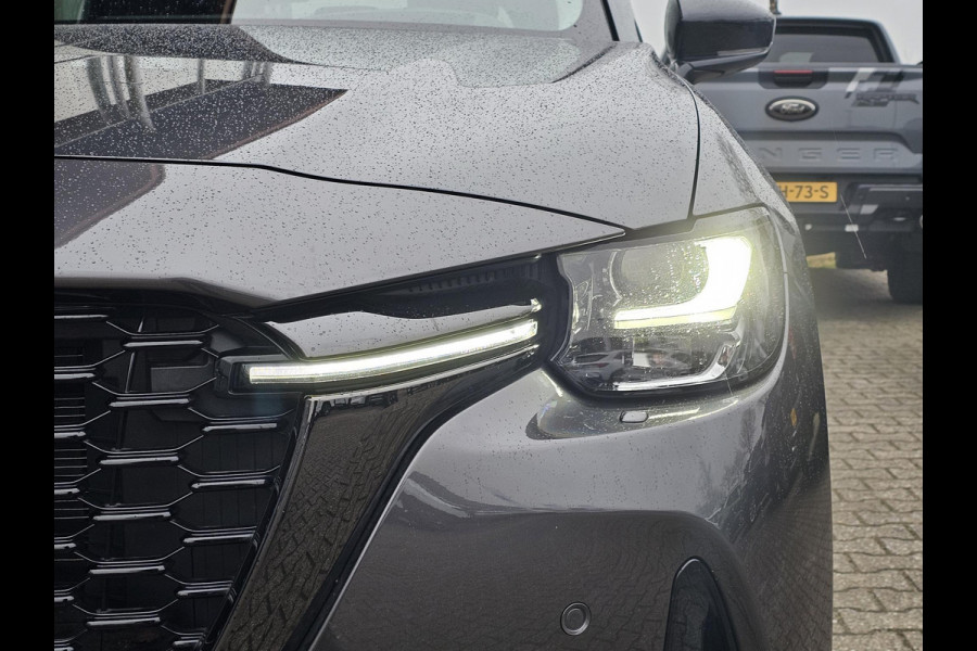 Mazda CX-60 2.5 e-SkyActiv PHEV Homura 325 pk | Nieuwstaat | Leder | Full led | Virtual cockpit | Head-up display | Adaptieve cruise control | Fabrieksgarantie 08-2029