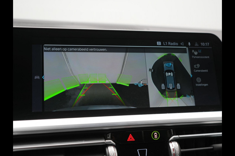 BMW 3 Serie Touring 330e Sportline Plug In Hybrid 293pk Dealer O.H PHEV | Panodak | Trekhaak af Fabriek | Lederen Sportstoelen Memory | 360 Camera | Keyless | Camera & Parkassist | 18"L.M | Apple Carplay | Sfeerverlichting |