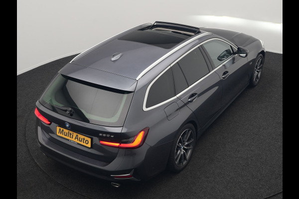 BMW 3 Serie Touring 330e Sportline Plug In Hybrid 293pk Dealer O.H PHEV | Panodak | Trekhaak af Fabriek | Lederen Sportstoelen Memory | 360 Camera | Keyless | Camera & Parkassist | 18"L.M | Apple Carplay | Sfeerverlichting |