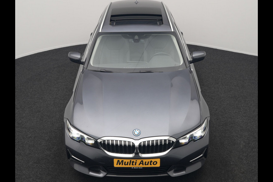 BMW 3 Serie Touring 330e Sportline Plug In Hybrid 293pk Dealer O.H PHEV | Panodak | Trekhaak af Fabriek | Lederen Sportstoelen Memory | 360 Camera | Keyless | Camera & Parkassist | 18"L.M | Apple Carplay | Sfeerverlichting |