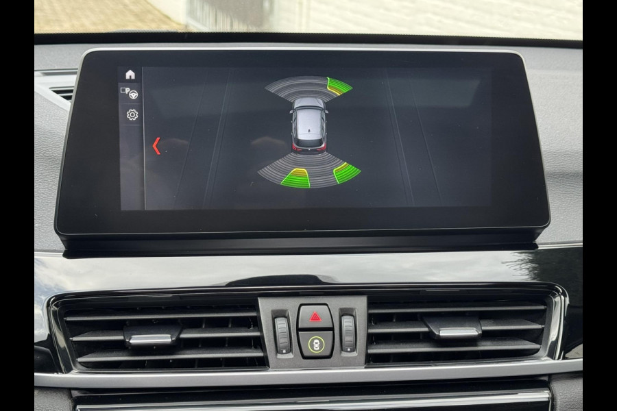BMW X1 SDrive 1.8i High Executive Head Up display Climate Cruise Pano Leer Navi PDC voor en achter