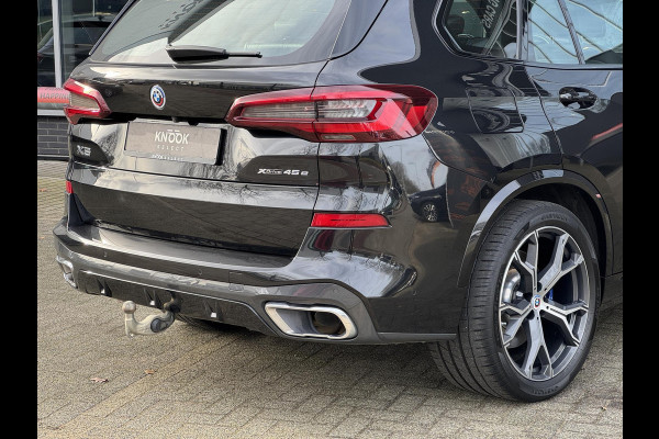 BMW X5 xDrive45e High Executive M Sport Pakket Automaat / Panoramadak / Active Steering / Trekhaak / Head-Up Display / Comfortstoelen / Laserlight / Driving Assistant Professional / 21 Inch / Luchtvering / Hifi / Craftedclarity / Shadow Line / M Sportremsysteem