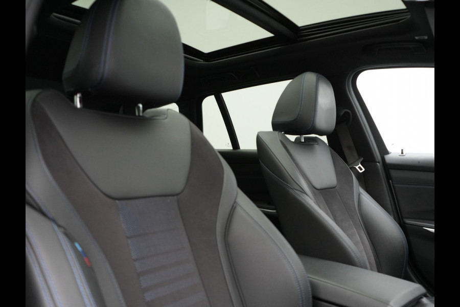 BMW 3 Serie Touring 320e M Sport FACELIFT MODEL Plug In Hybrid Dealer O.H PHEV | Panodak | Trekhaak af Fabriek | Adaptive Cruise |  Alcantara Sportstoelen Memory | Widescreen Navi | Keyless | Sfeerverlichting | Apple Carplay | 18"L.M |