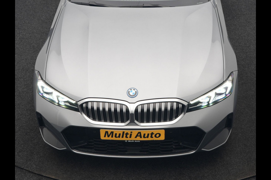 BMW 3 Serie Touring 320e M Sport FACELIFT MODEL Plug In Hybrid Dealer O.H PHEV | Panodak | Trekhaak af Fabriek | Adaptive Cruise |  Alcantara Sportstoelen Memory | Widescreen Navi | Keyless | Sfeerverlichting | Apple Carplay | 18"L.M |
