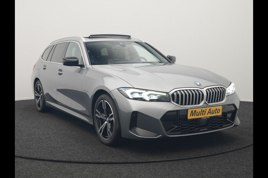 BMW 3 Serie Touring 320e M Sport FACELIFT MODEL Plug In Hybrid Dealer O.H PHEV | Panodak | Trekhaak af Fabriek | Adaptive Cruise |  Alcantara Sportstoelen Memory | Widescreen Navi | Keyless | Sfeerverlichting | Apple Carplay | 18"L.M |