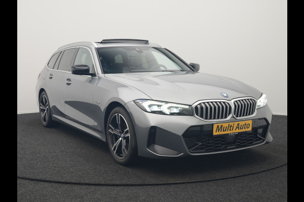 BMW 3 Serie Touring 320e M Sport FACELIFT MODEL Plug In Hybrid Dealer O.H PHEV | Panodak | Trekhaak af Fabriek | Adaptive Cruise |  Alcantara Sportstoelen Memory | Widescreen Navi | Keyless | Sfeerverlichting | Apple Carplay | 18"L.M |