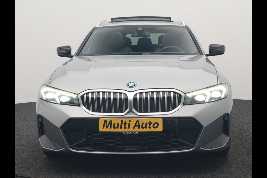 BMW 3 Serie Touring 320e M Sport FACELIFT MODEL Plug In Hybrid Dealer O.H PHEV | Panodak | Trekhaak af Fabriek | Adaptive Cruise |  Alcantara Sportstoelen Memory | Widescreen Navi | Keyless | Sfeerverlichting | Apple Carplay | 18"L.M |