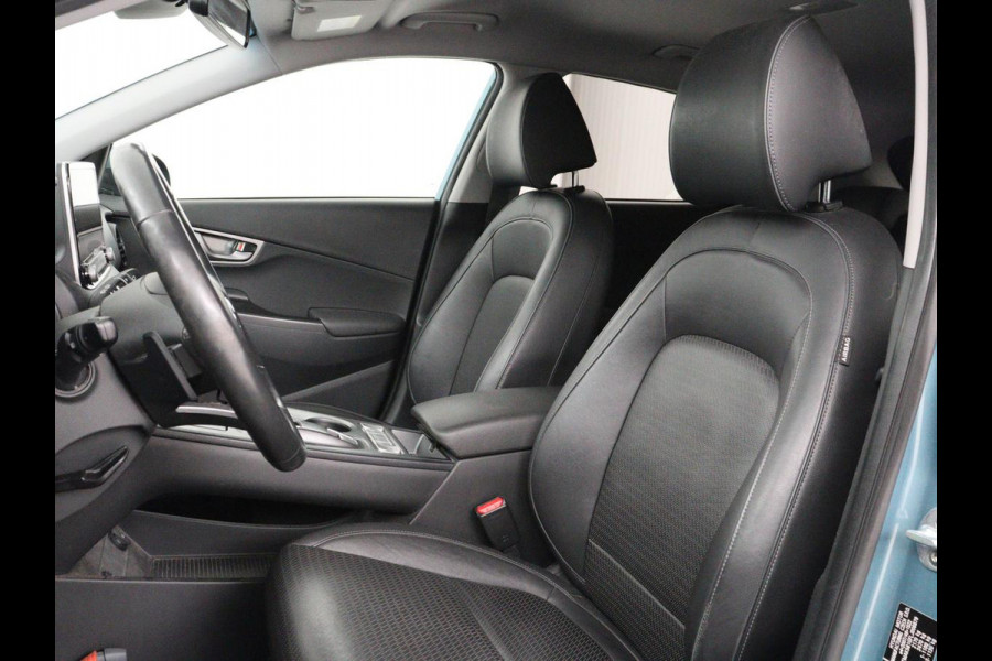 Hyundai Kona EV Premium 64 kWh | SOH 95% | Stoelventilatie | Leder | Head-Up | Warmtepomp | Camera | Achterbankverwarming | Carplay | Navigatie | Adaptive cruise | Keyless | Parkeerhulp