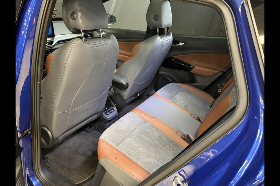 Volkswagen ID.4 First Max 77 kWh | SoH 90% | Panoramakdak | Elek. Trekhaak | Stoel/stuurverw. | ACC | 21''inch | Camera